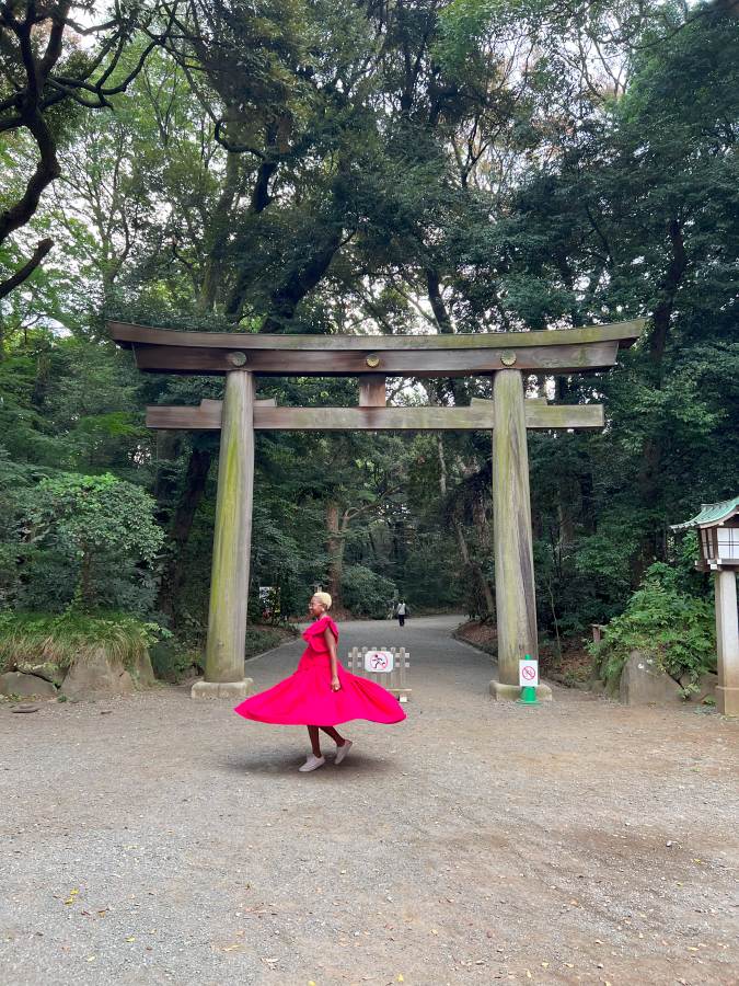 Dee from Well Worn Heels in front of a temple in Japan