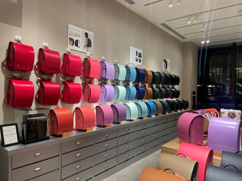 Collection of vintage designer handbags, a popular luxury souvenir from Japan.