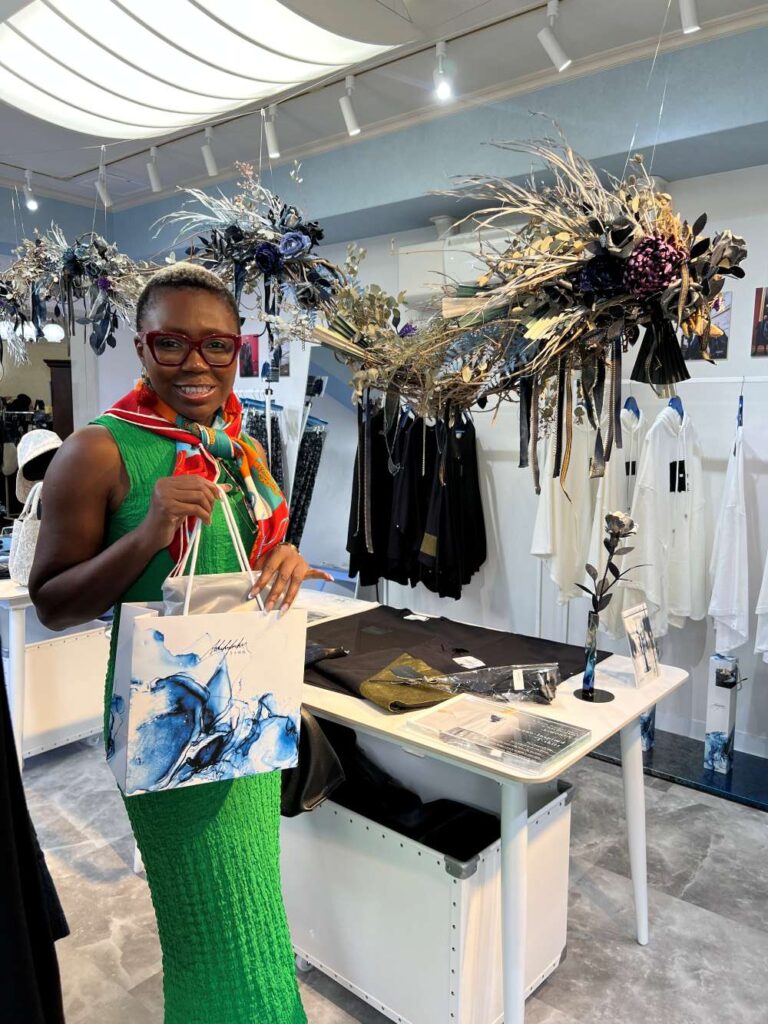 Traveler holding a shopping bag after buying the best souvenirs from Japan.