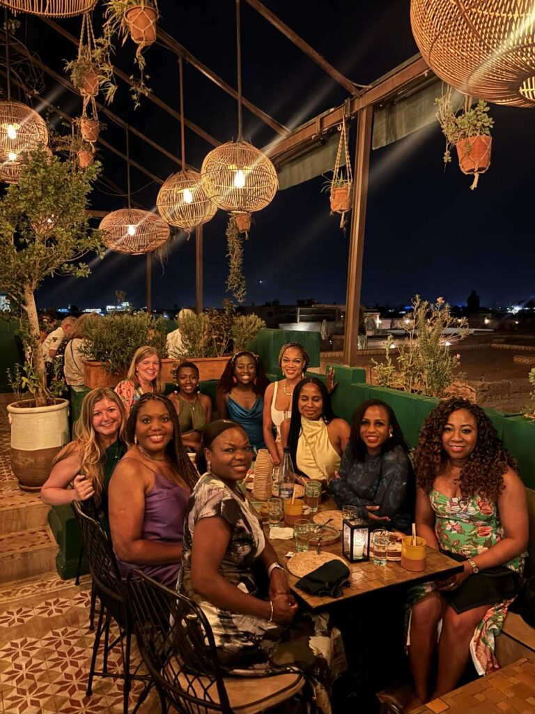 Dee with friends celebrating her 40th birthday dinner party in Marrakech