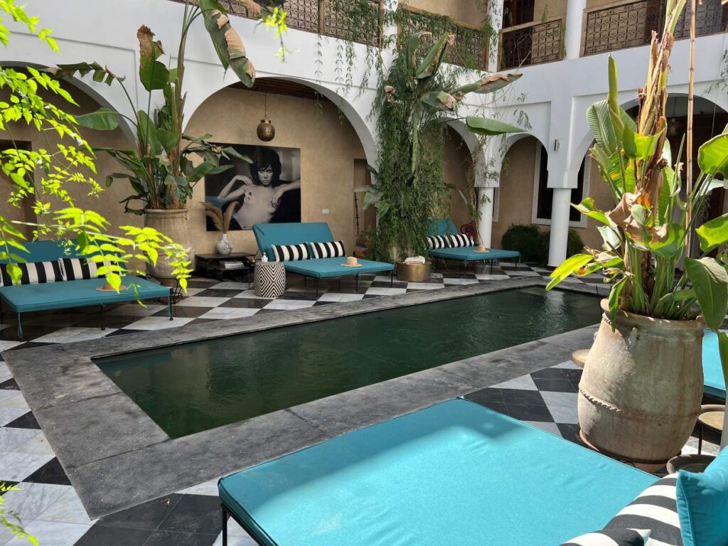 The pool area of luxury riad, Riad Sakkan, a boutique hotel in Marrakech.