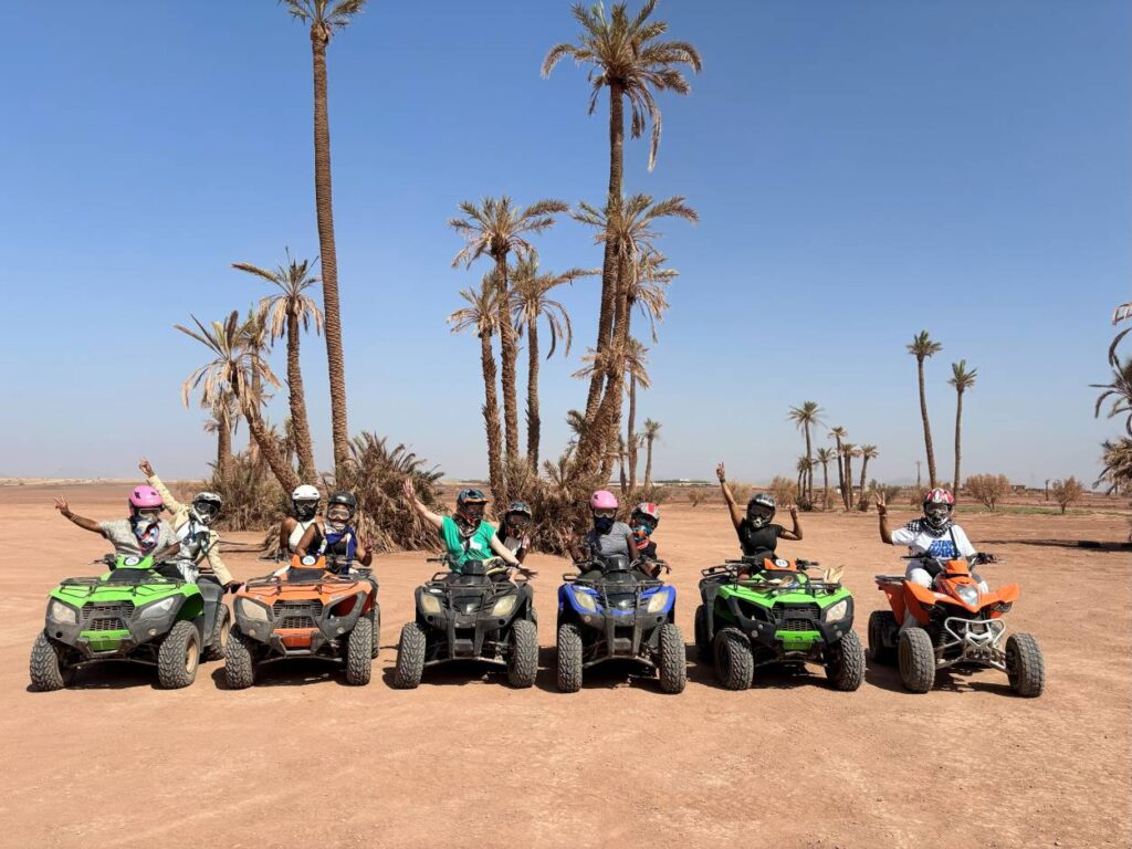 A group of friends having fun quad biking at Atlas mountain, Marrakech.