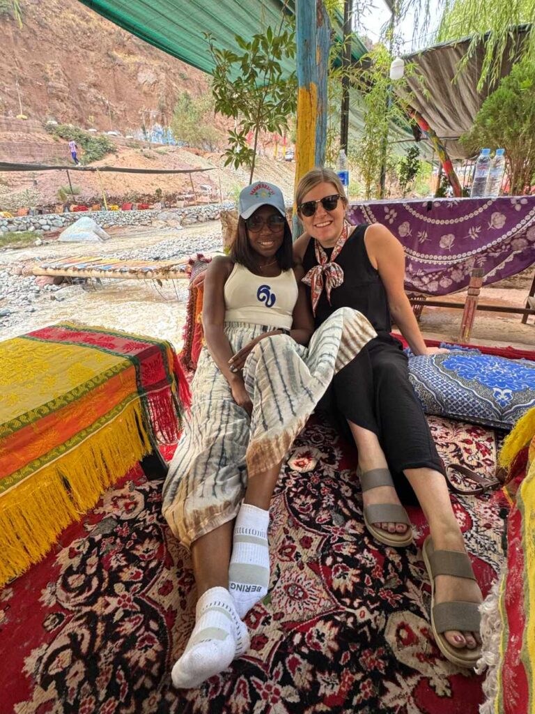 Dee and a friend at a riverside restaurant for lunch at Atlas Mountain, Marrakech.