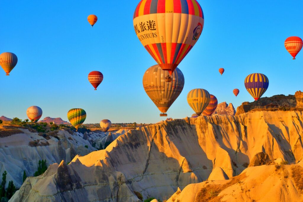 Hot air balloons floating over Cappadocia, Turkey, highlighting unforgettable best 40th birthday travel ideas