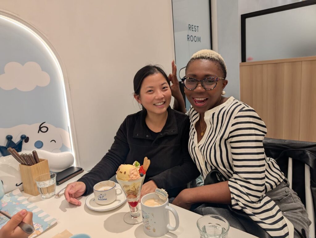 Dee meeting up with a college friend in Tokyo on one of many travels in 2025.