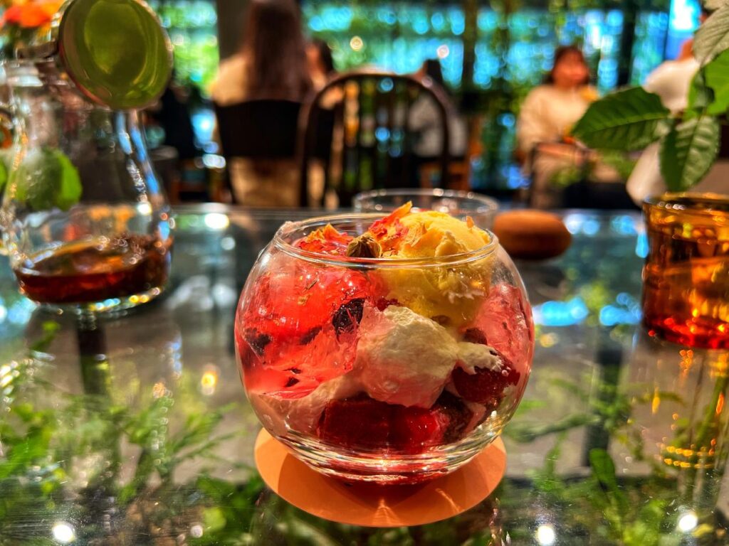 The flower parfait at Aoyama Flower Market Tea House made of fragrant rose jelly, ice cream, crunchy cereal, and cherry mouse