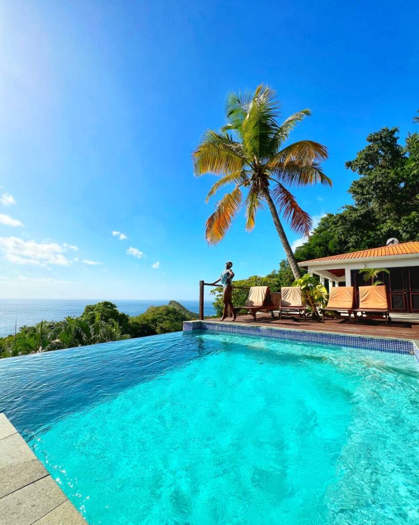 Infinity pool with Piton views at a luxury St. Lucia resort, representing breathtaking 40th birthday getaway ideas