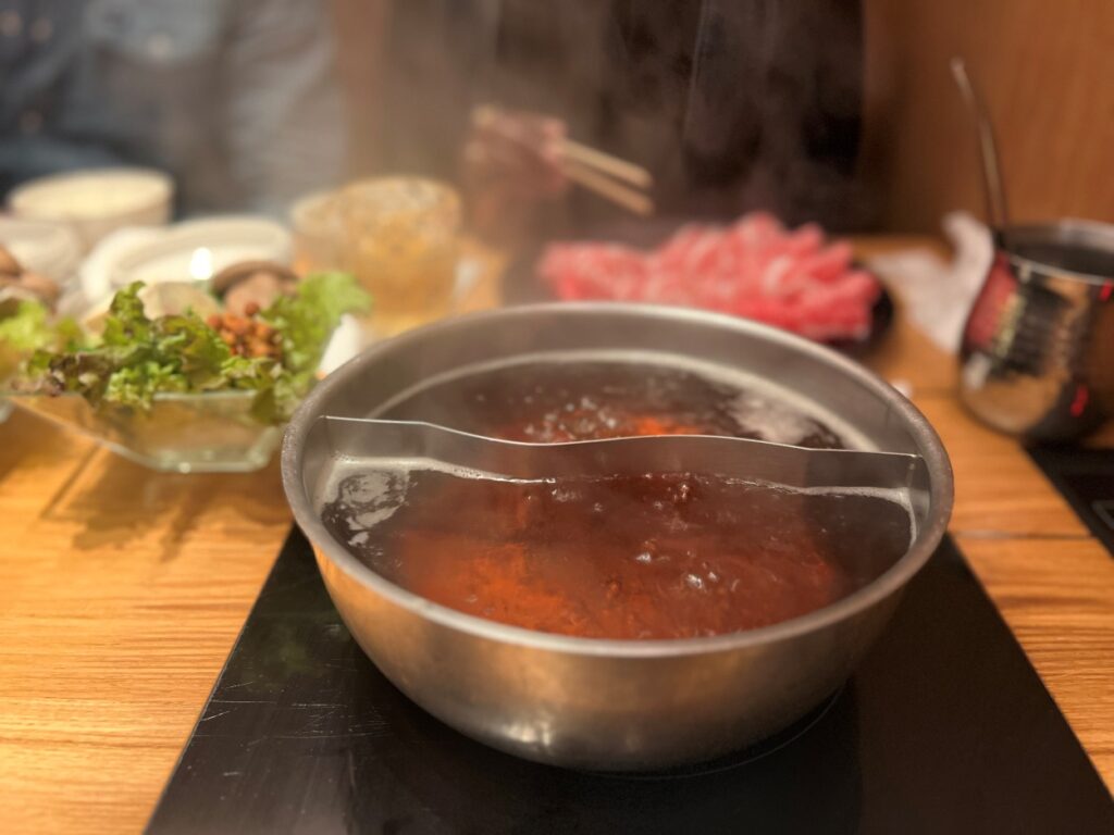 Shabu-shabu hot pot meal in Japan, highlighting communal and comforting 40th birthday food tour ideas