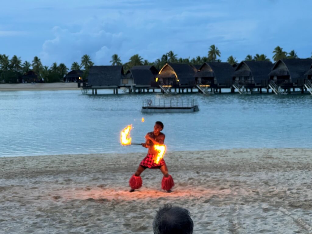 A cultural performance with fire for tourists at Marriott Momi Bay in Fiji.