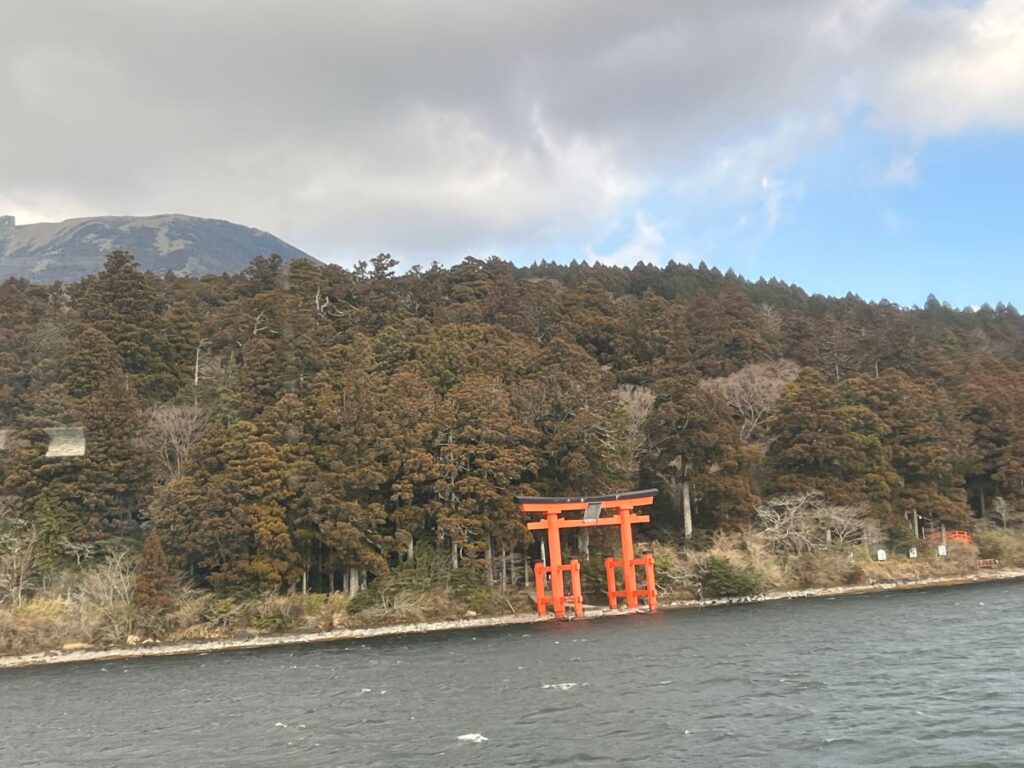 A view of Torii gate, one of the holiest shrines in Hakone, from across Lake Ashi