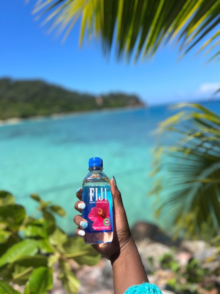 Fiji water served to a guest at Likuliku Lagoon Resort on their stay.