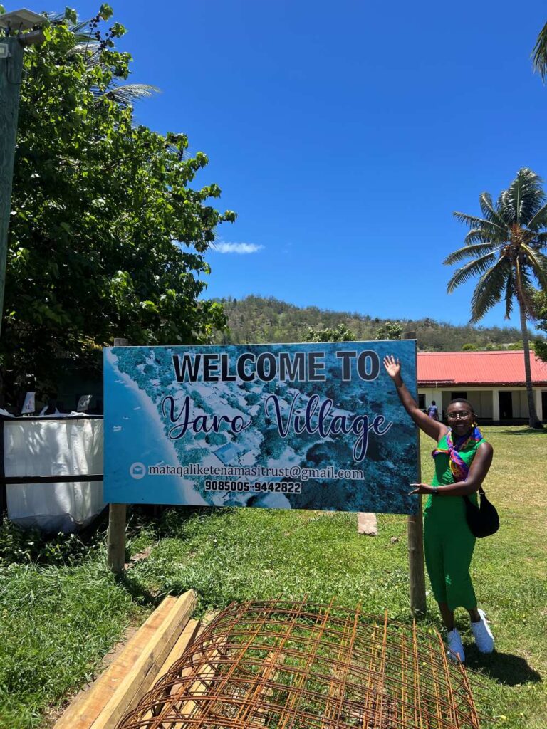 An excited guest's arrival at Yaro village for a stay at Likuliku Lagoon Resort in Fiji.