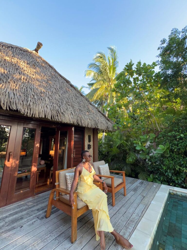 The outdoor seating area with a view of the plunge pool at Likuliku Lagoon Resort, Fiji.