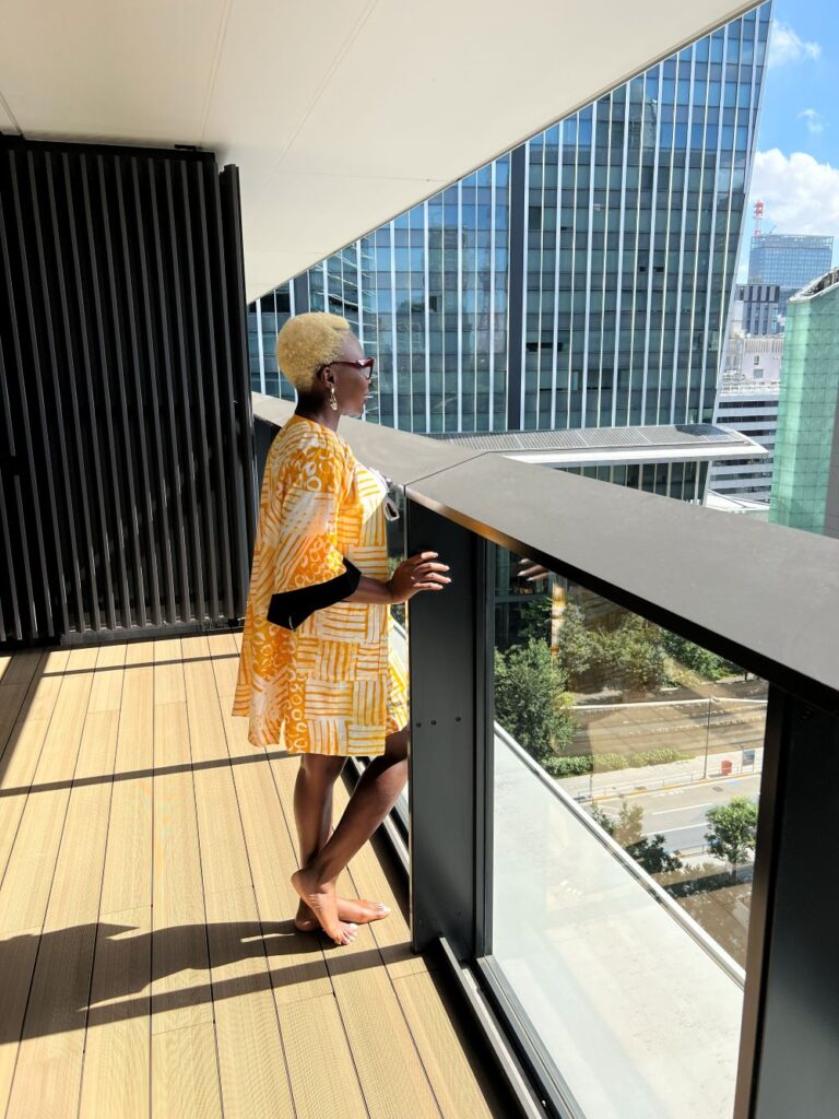 A solo woman traveler shares her experience of moving to Japan for work from the US
