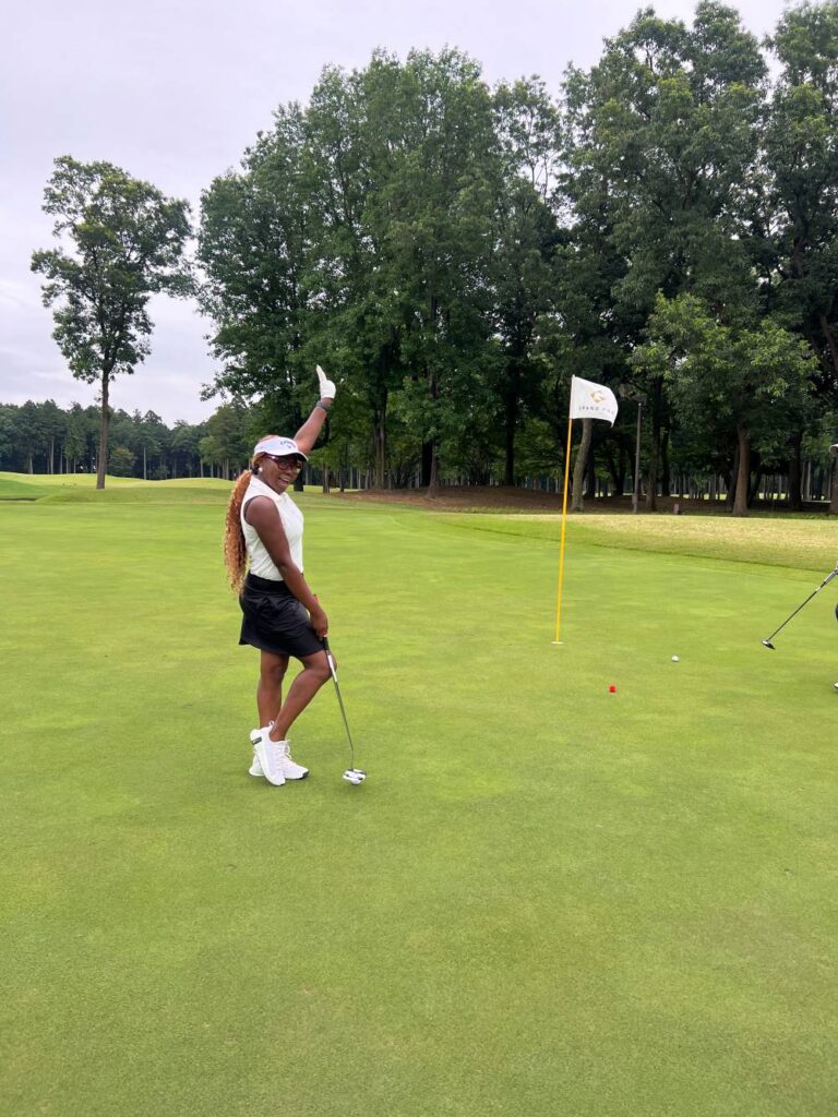A Nigerian_American living in Japan for work plays golf before leaving Japan