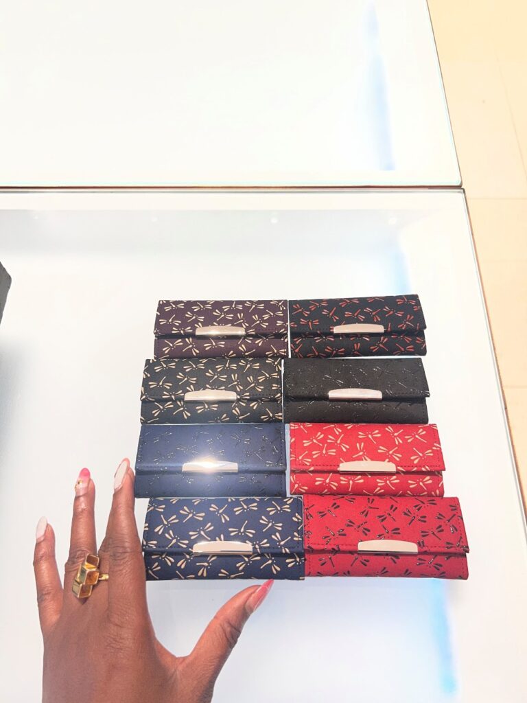 Shopping at Indenya for purses with dragonflies before leaving Japan