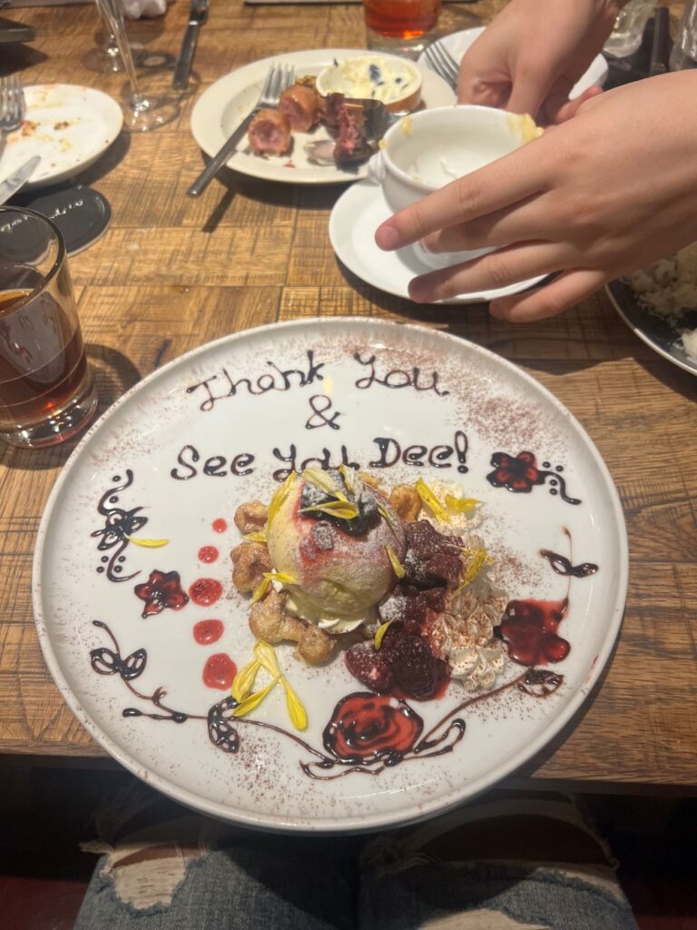 A global office team members bid farewell to a colleague leaving Japan after living there as an expat.