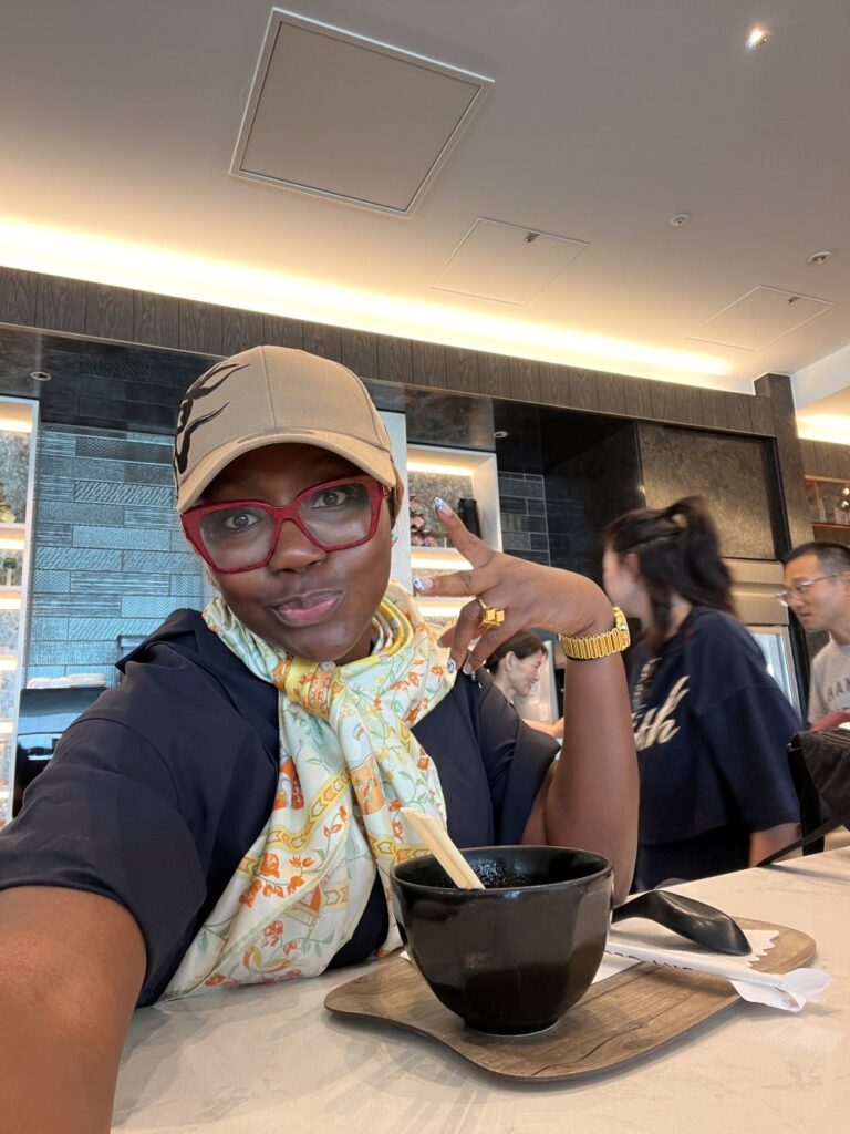 An expat enjoying a last bowl of ramen at the airport lunge before leaving Japan.