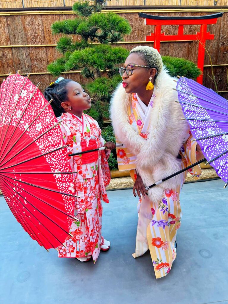 Nigerian Americans dressed up in Japanese kimono on a trip to Japan